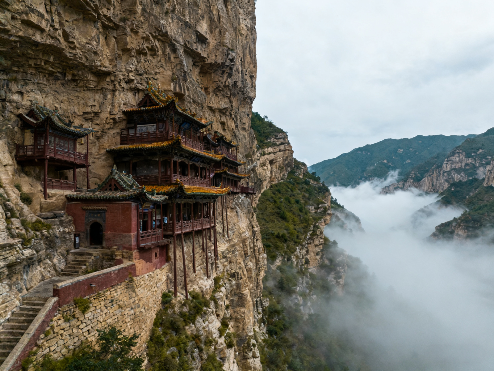 The Hanging Monastery clings to a sheer cliff at Northern Mount Heng—timber halls pinned into rock.